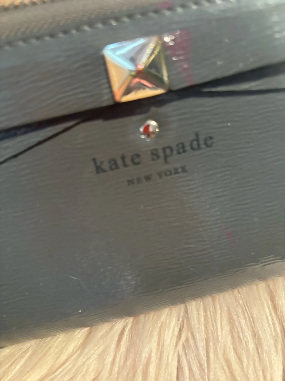 grey Kate Spade Beacon Court patent leather wallet